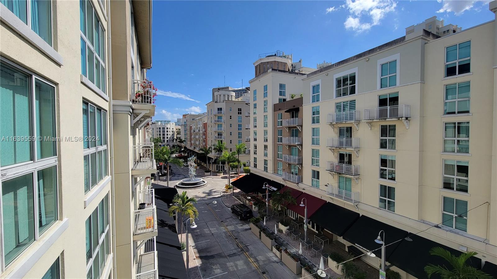 a city street lined with tall buildings