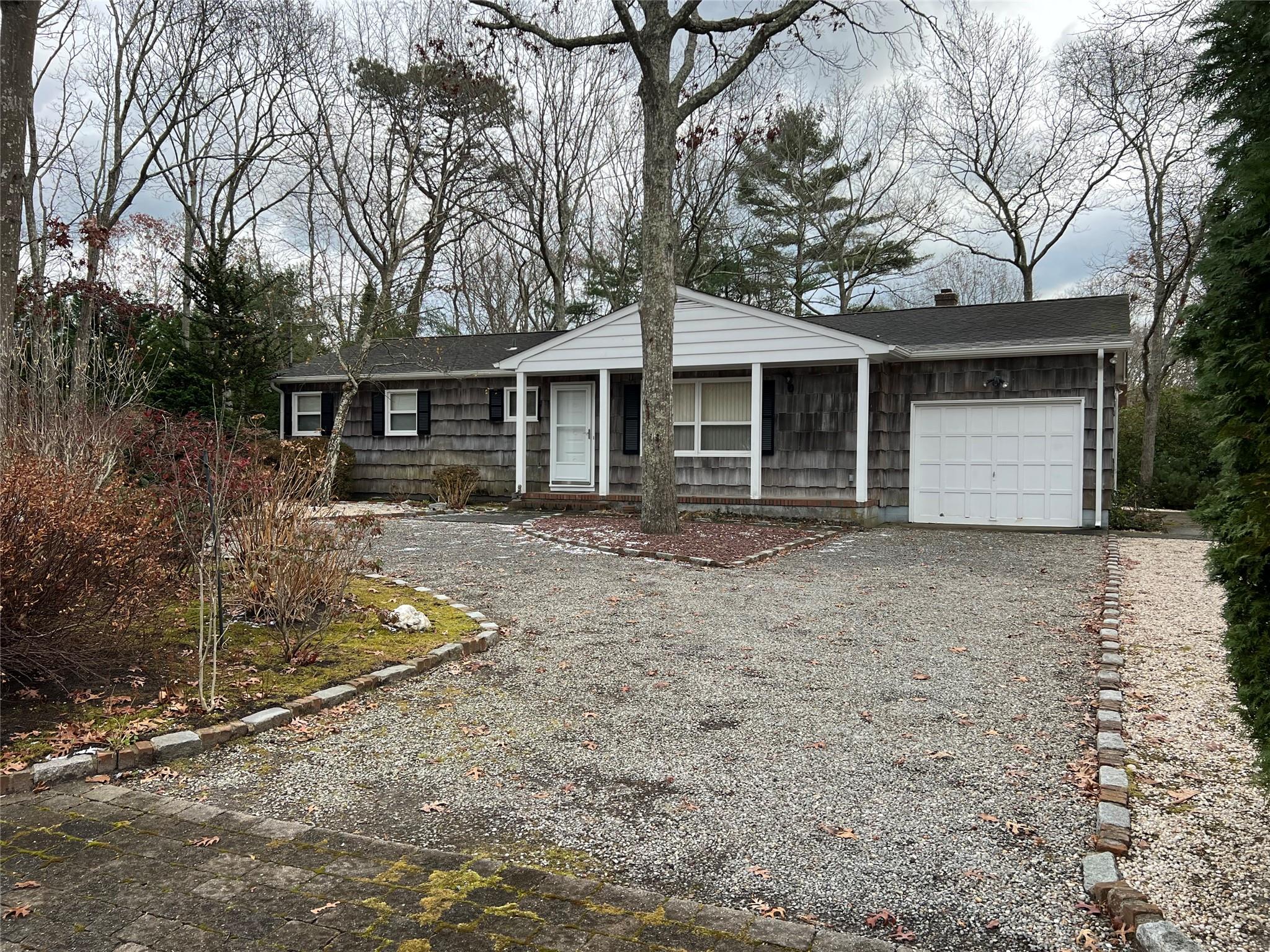 Single story home with a garage