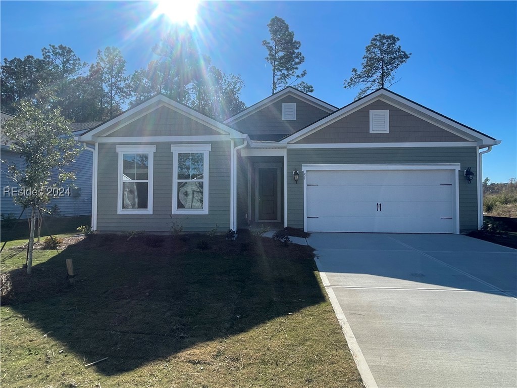 View of front of home with a garage