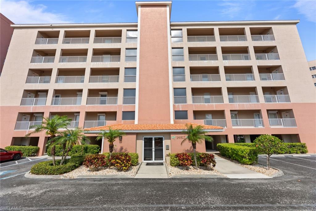 a front view of a multi story residential apartment building