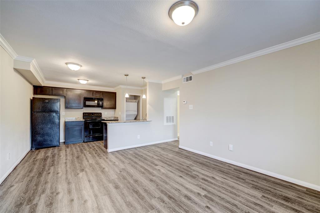 a view of kitchen and microwave