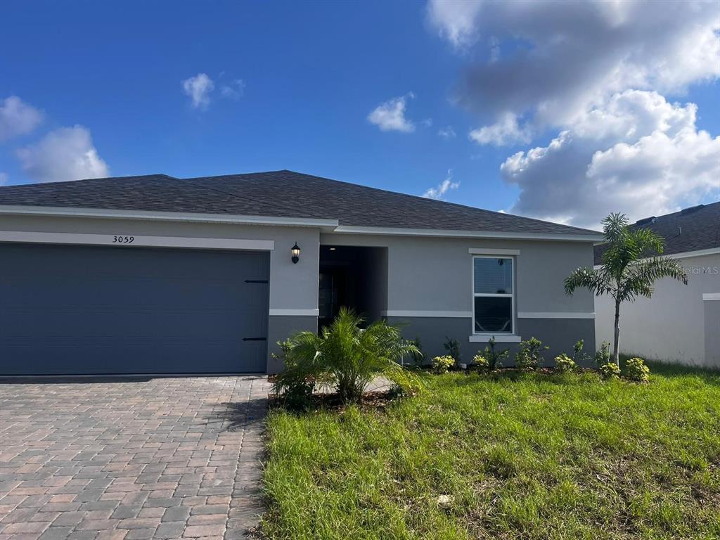 a front view of house with yard