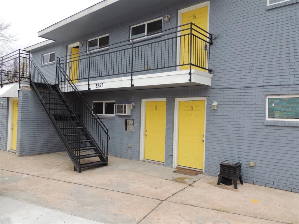 a front view of a house with parking