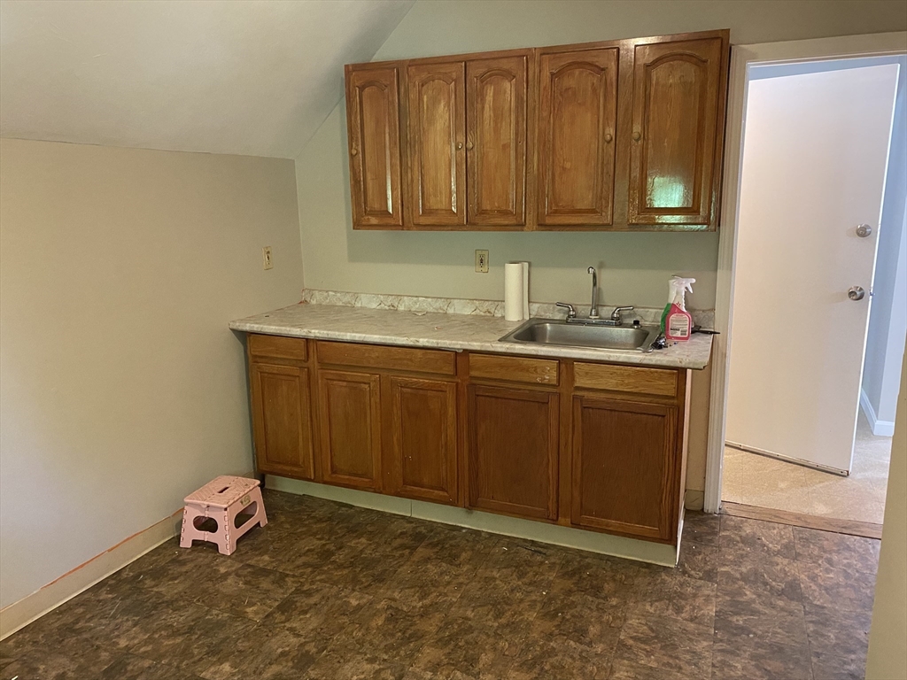 a utility room with a sink