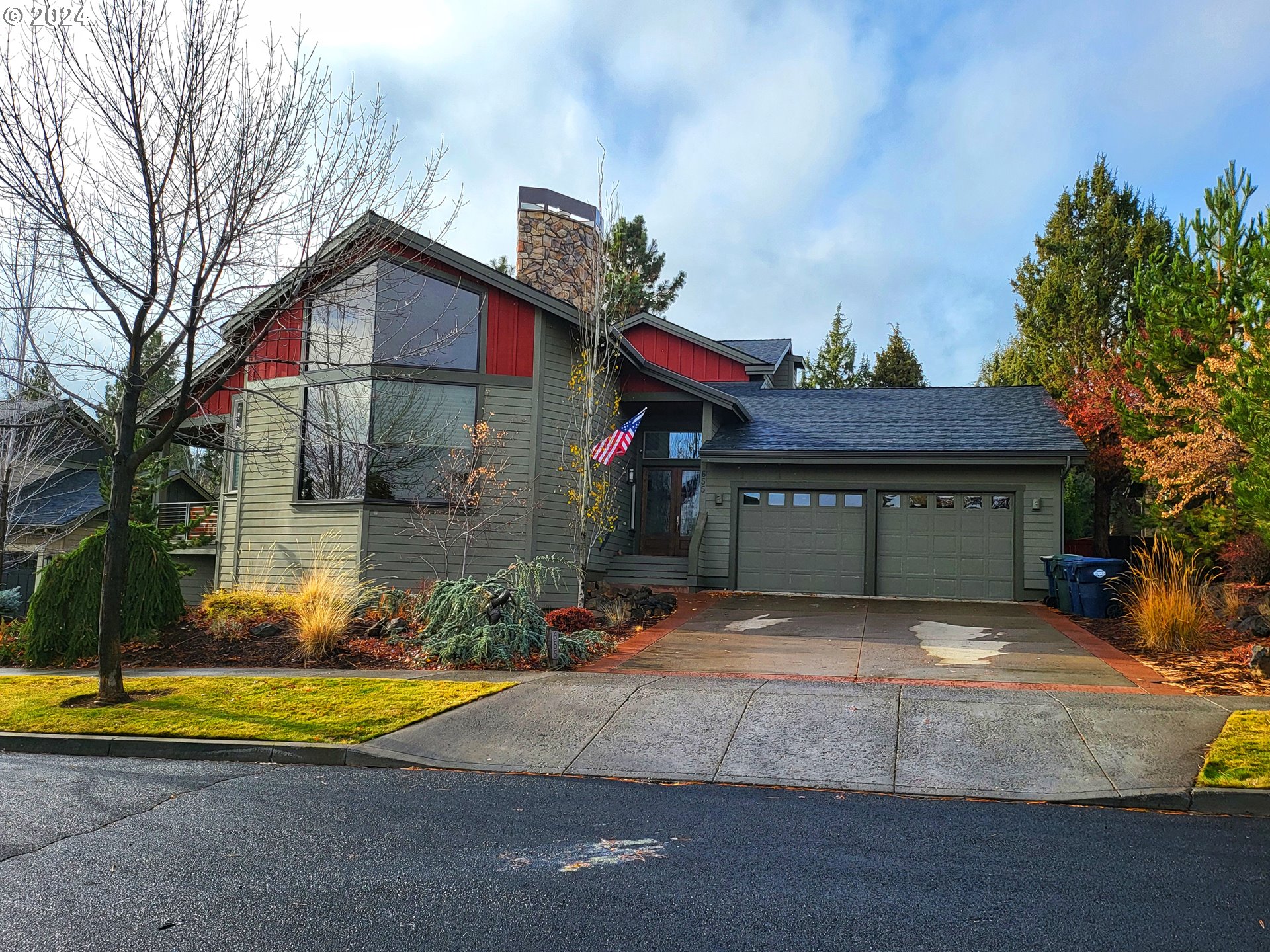 a view of the house with a yard