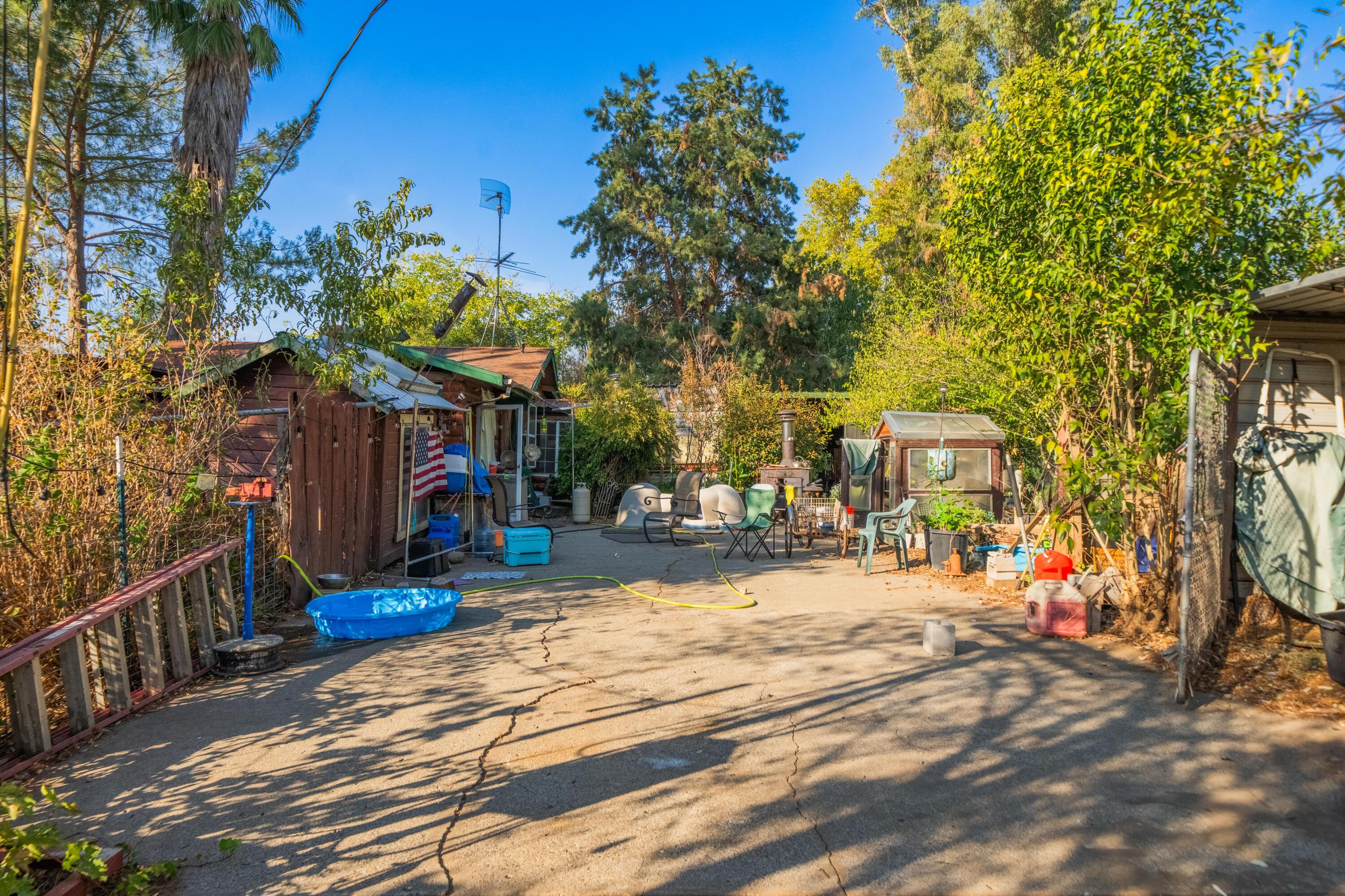 a view of a park with swings and slides