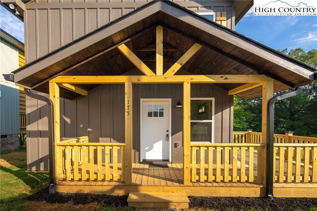 a front view of a house with a porch