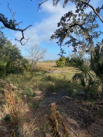 $100,000 | 7063 Whistling Alligator Way