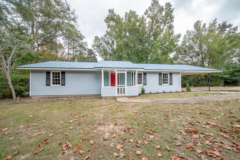 front view of a house with a yard