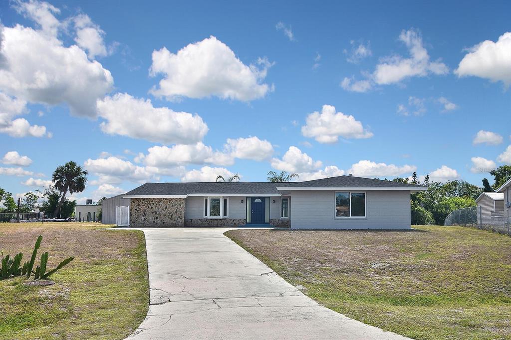 a view of house with outdoor space