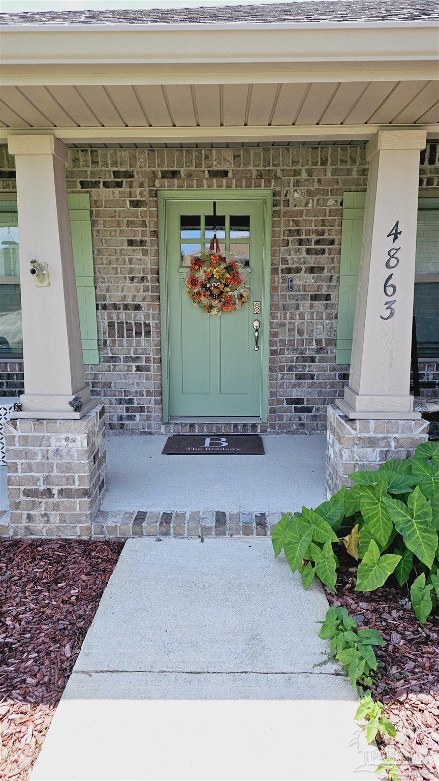 a front view of a house with a shower