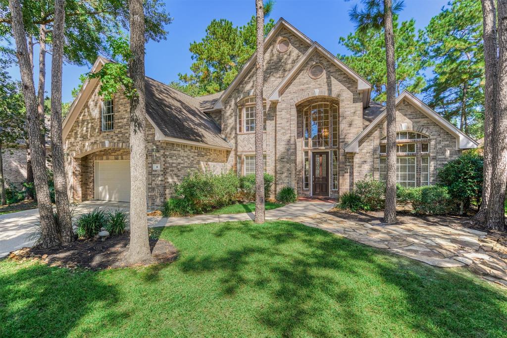 Welcome home to 14 Clarion Ridge, in the highly coveted Cypress lake neighborhood in Alden Bridge. This custom built home by Meadowlark sits on a lovely Cul de Sac street.