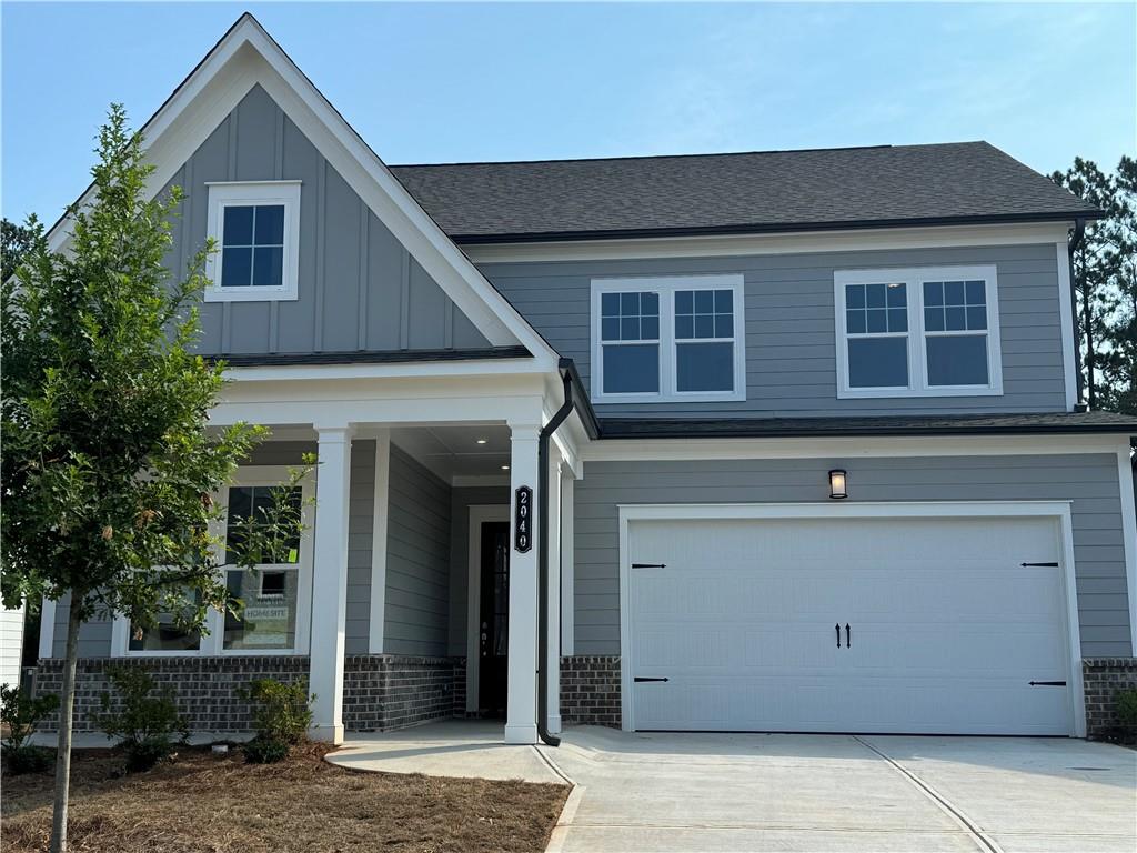 front view of a house with a small yard