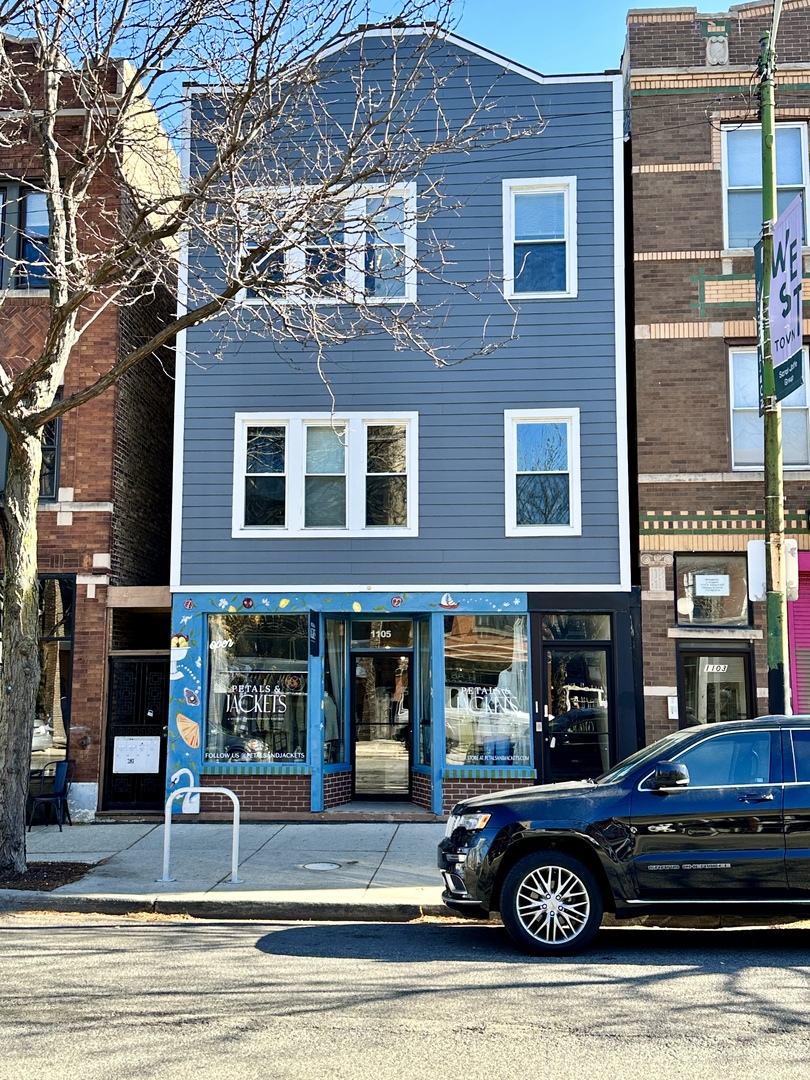 a car parked in front of a building