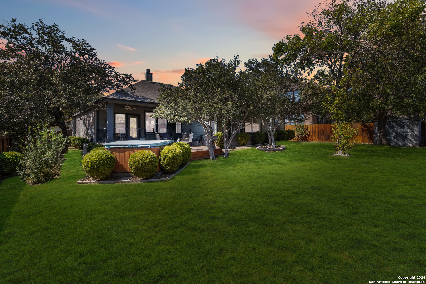 a view of a house with a big yard