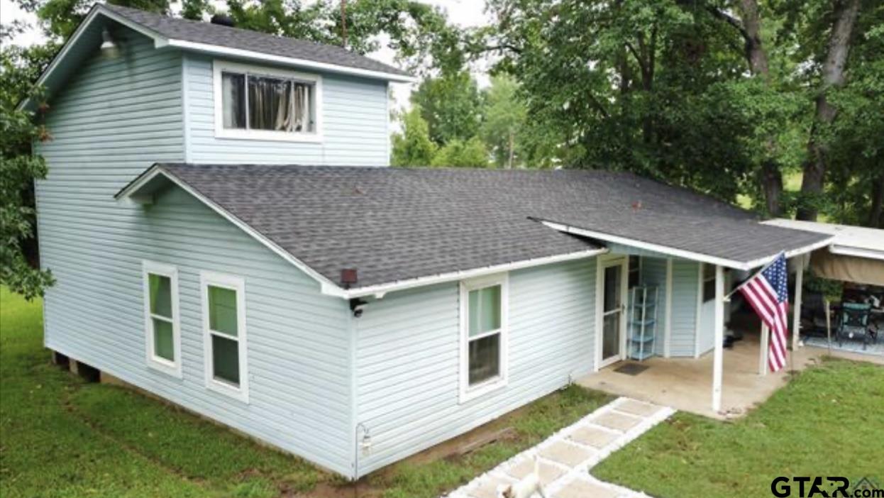 a view of outdoor space yard and front view of a house