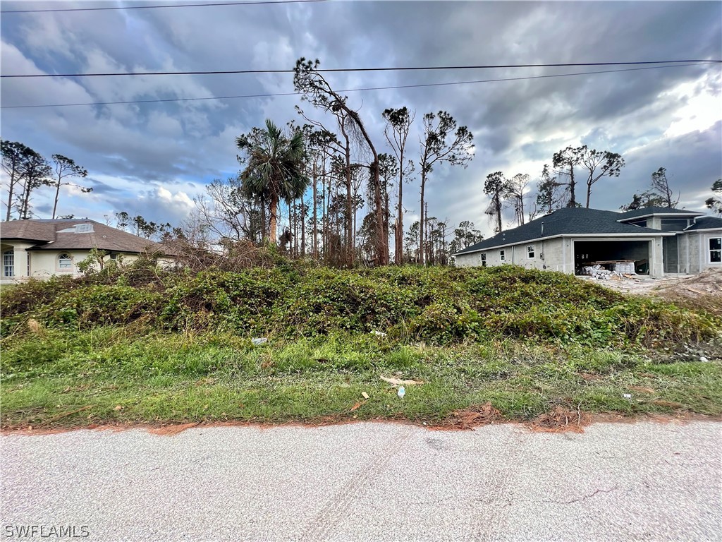 a view of a house with a street