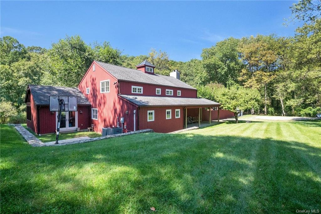 a view of a house with a big yard