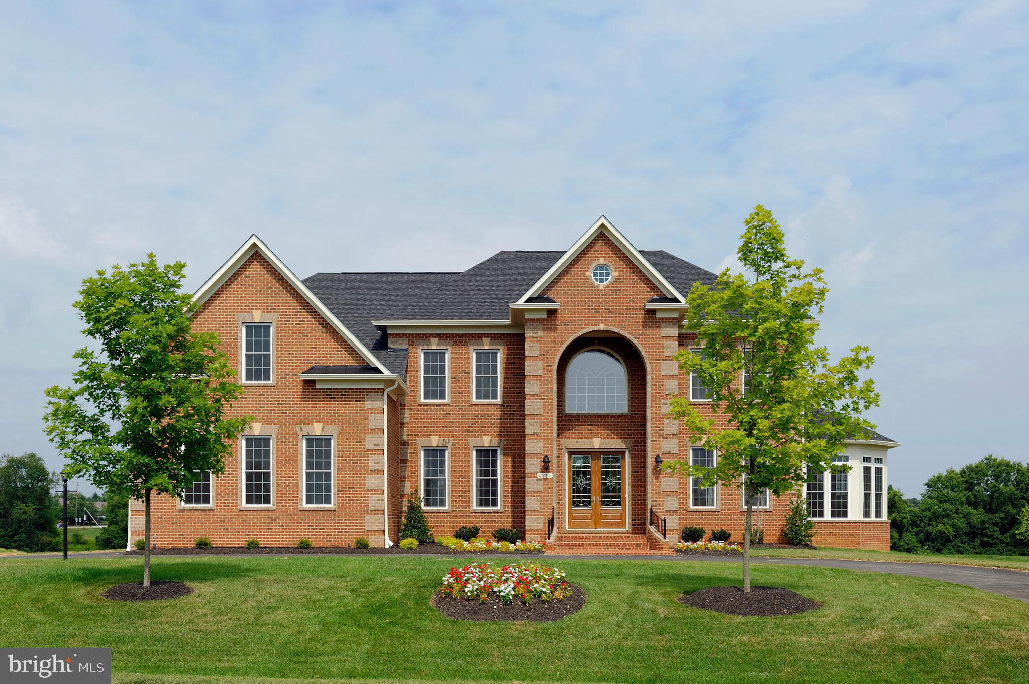 front view of house with a yard