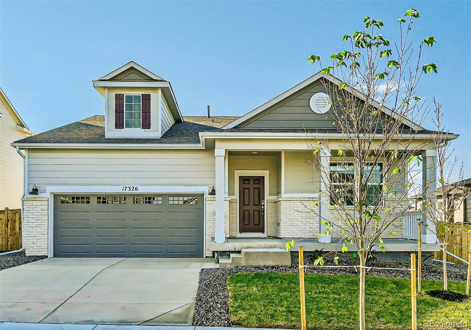 front view of a house with a garage