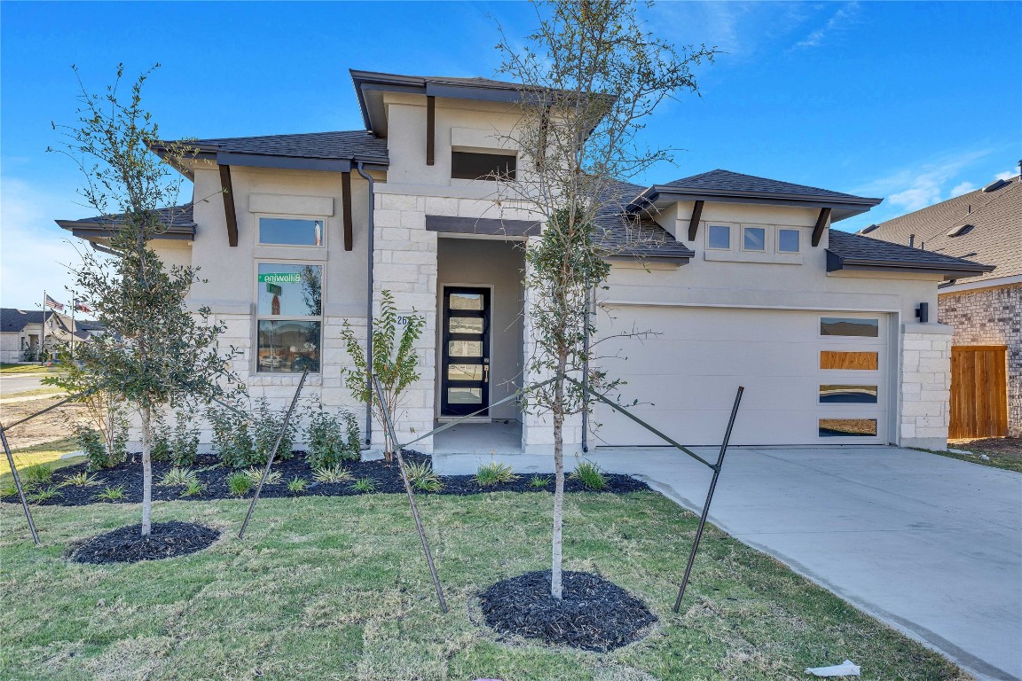 a house view with a garden space