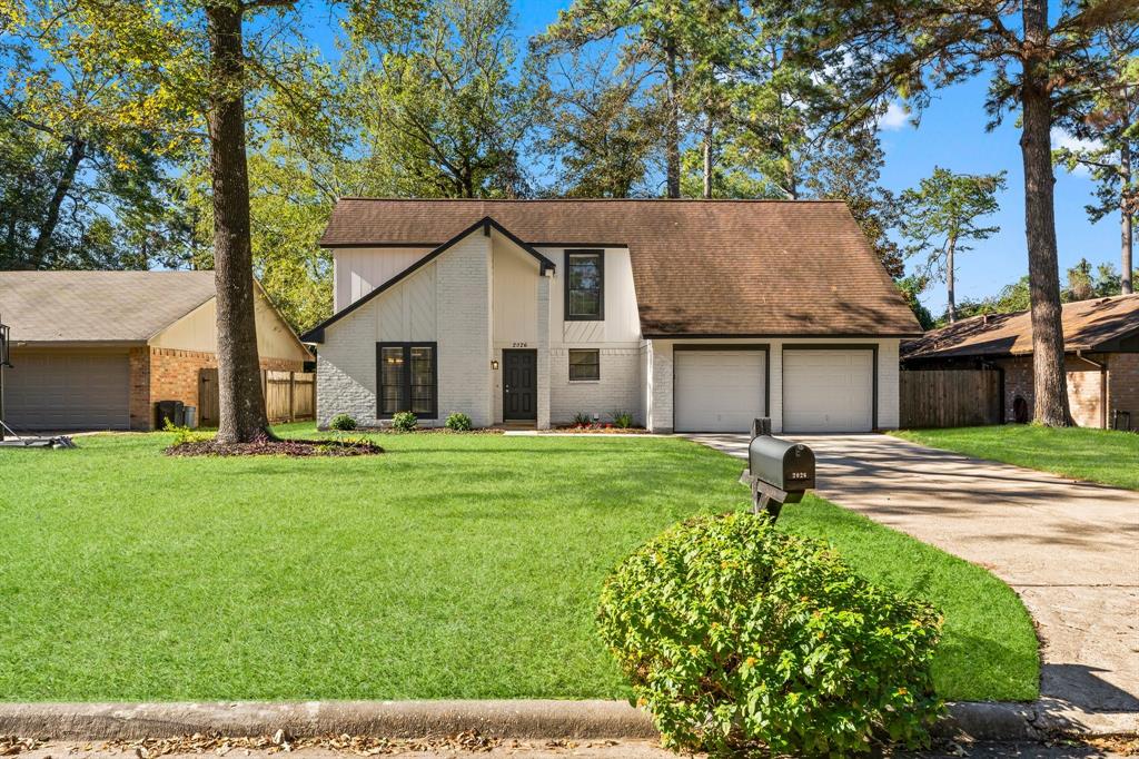 a house view with a garden space