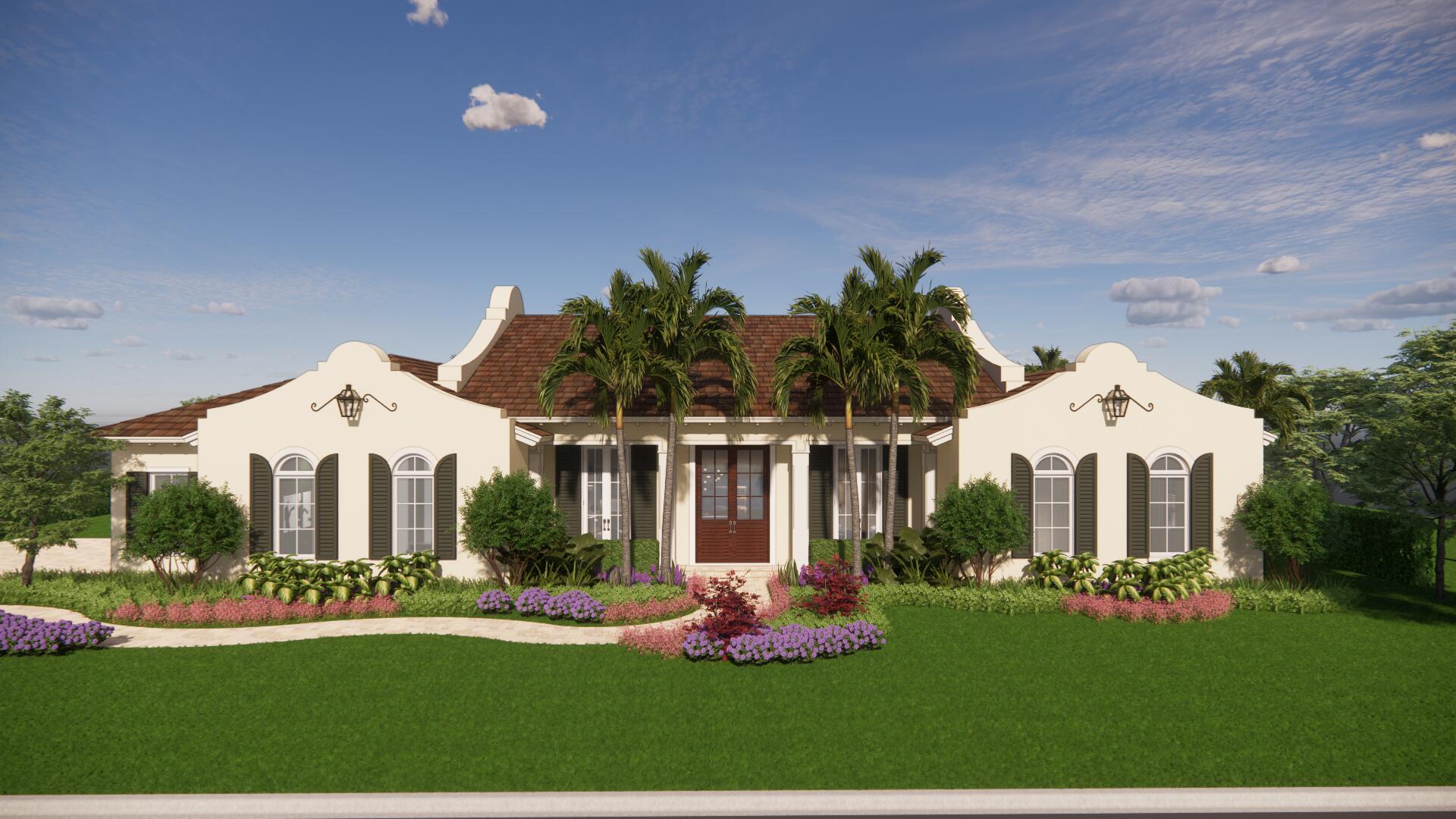 a front view of a house with a yard and potted plants