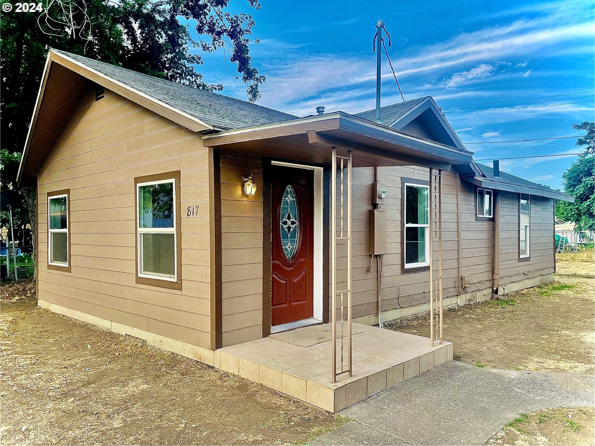 a front view of a house with a porch