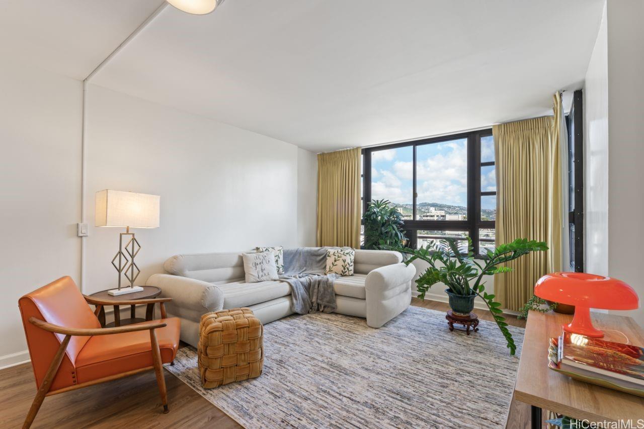 Large Living area.  Cement walls, smooth ceilings and new lighting.