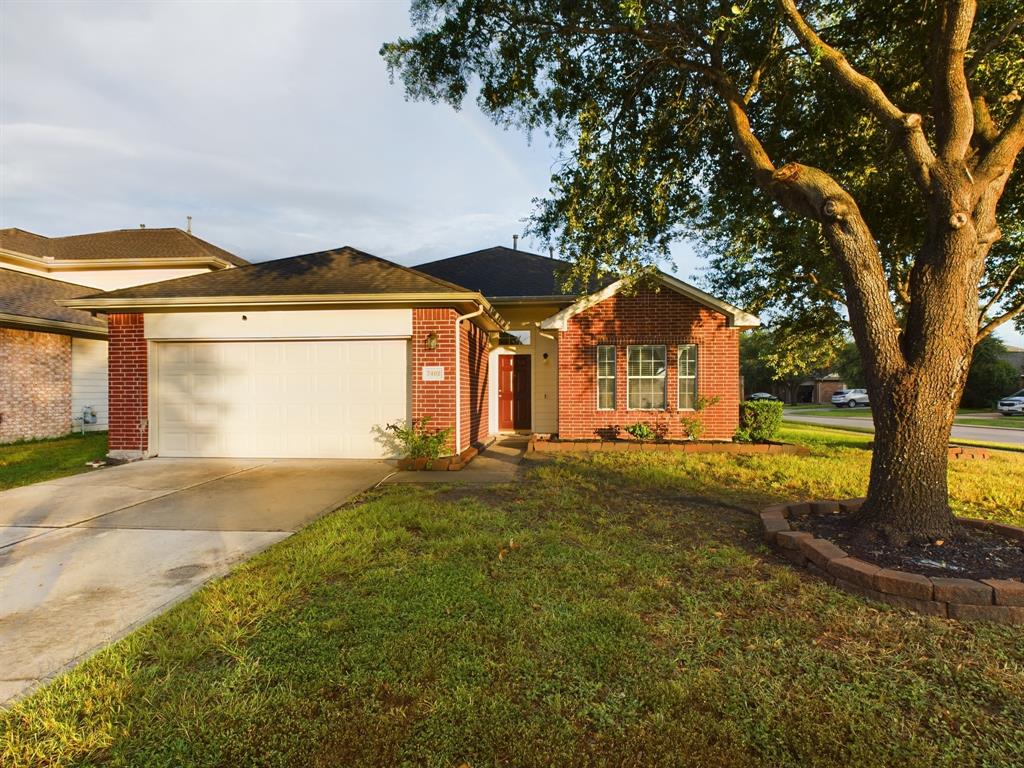 a front view of a house with yard