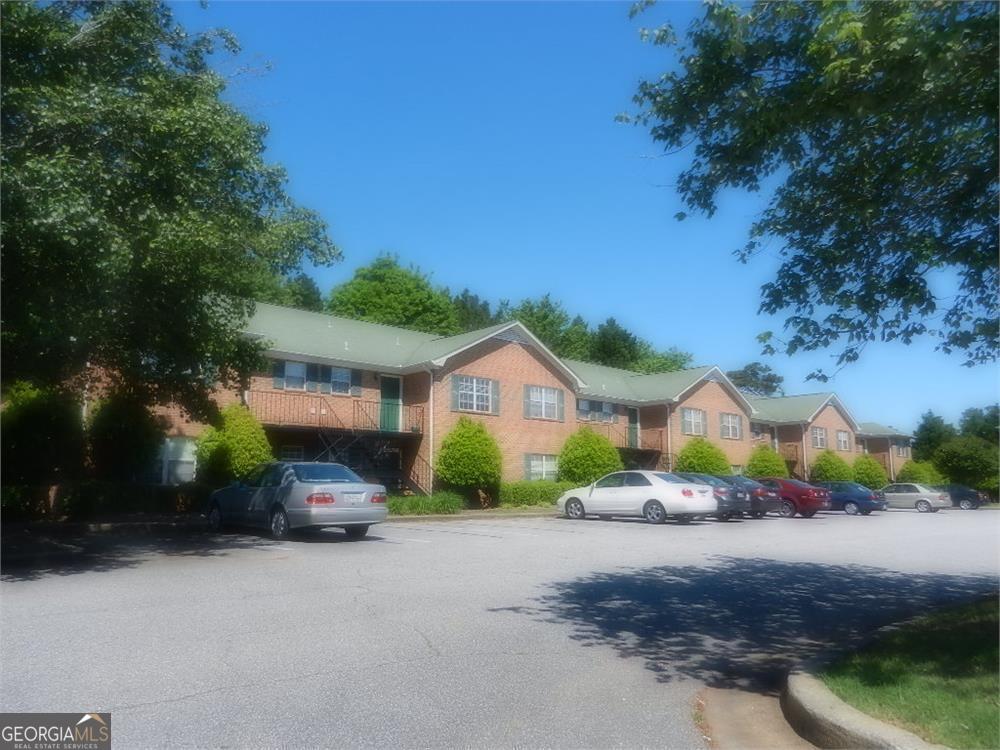 a view of house with outdoor space and street view