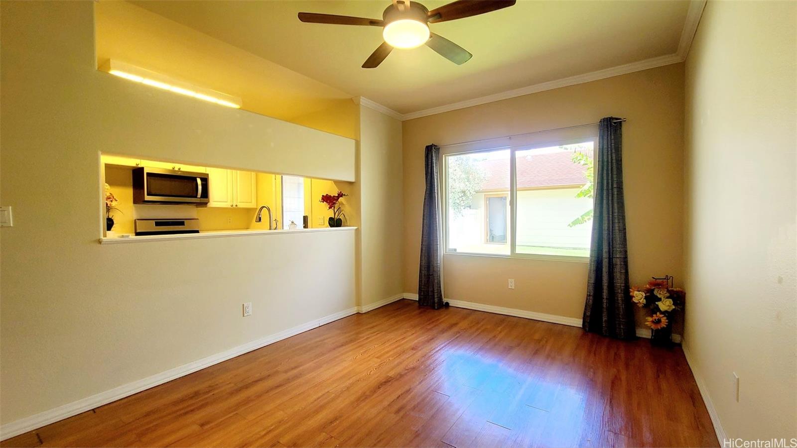 a view of a livingroom with wooden floor