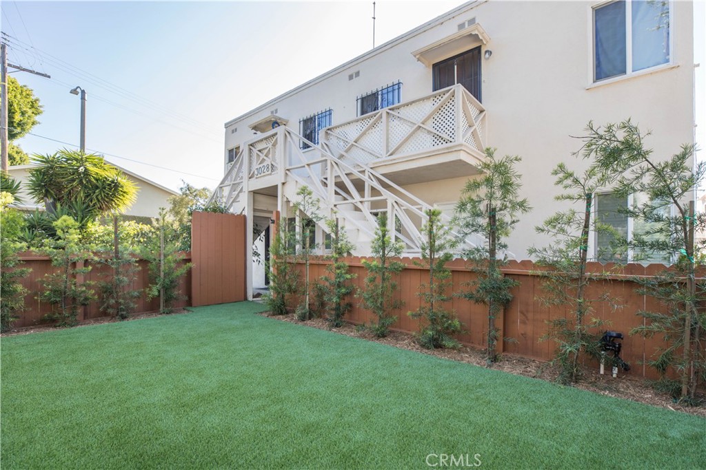 a view of a backyard with plants