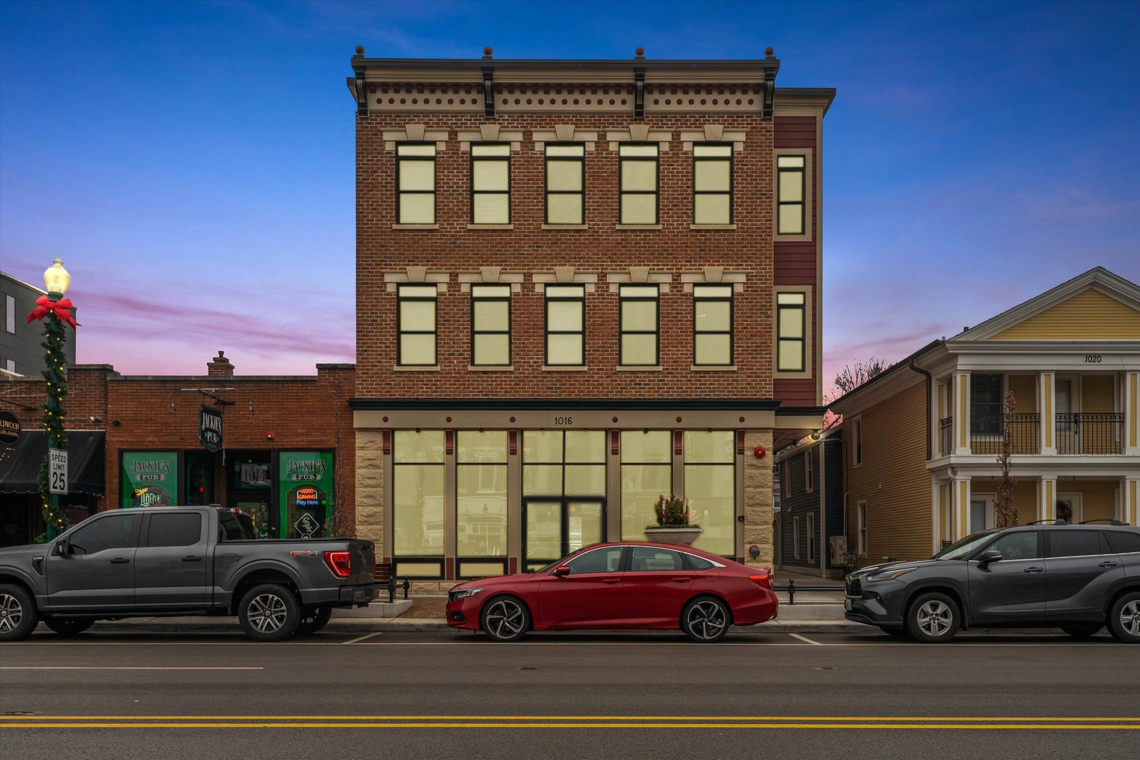 a view of a car parked in front of a building