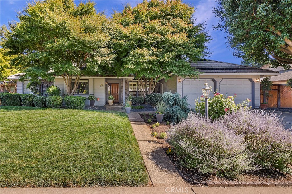 a house view with a garden space