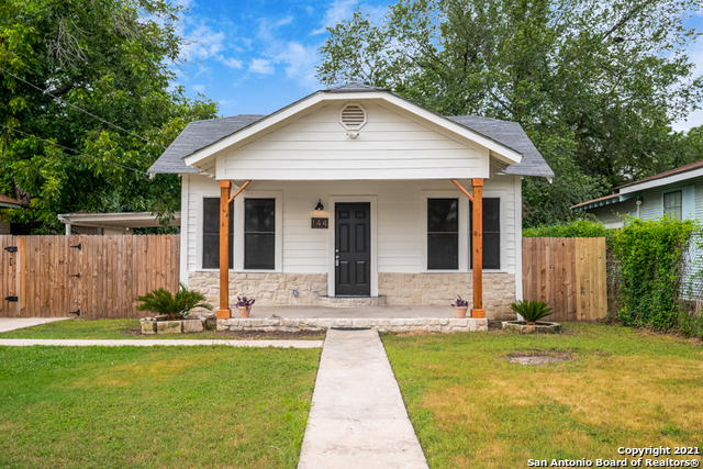 a front view of house with yard