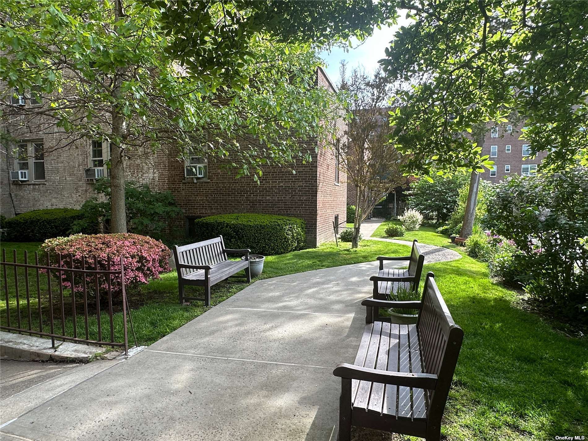 a garden view with a seating space