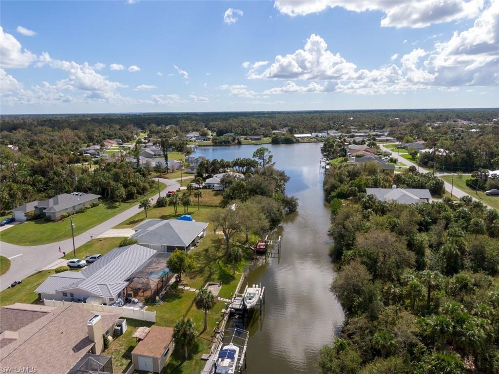 an aerial view of a houses with outdoor space