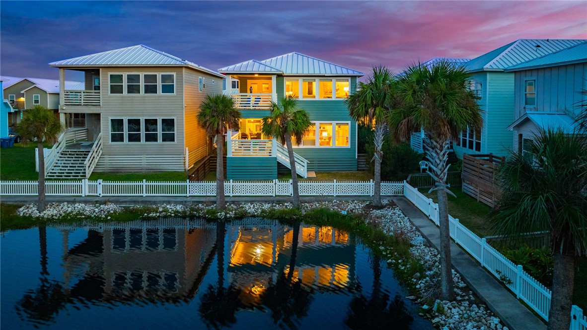 Evening rear view of this gorgeous home!