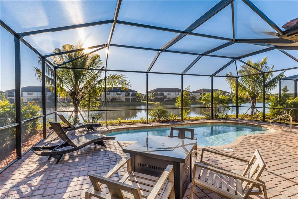 a view of a swimming pool with a patio