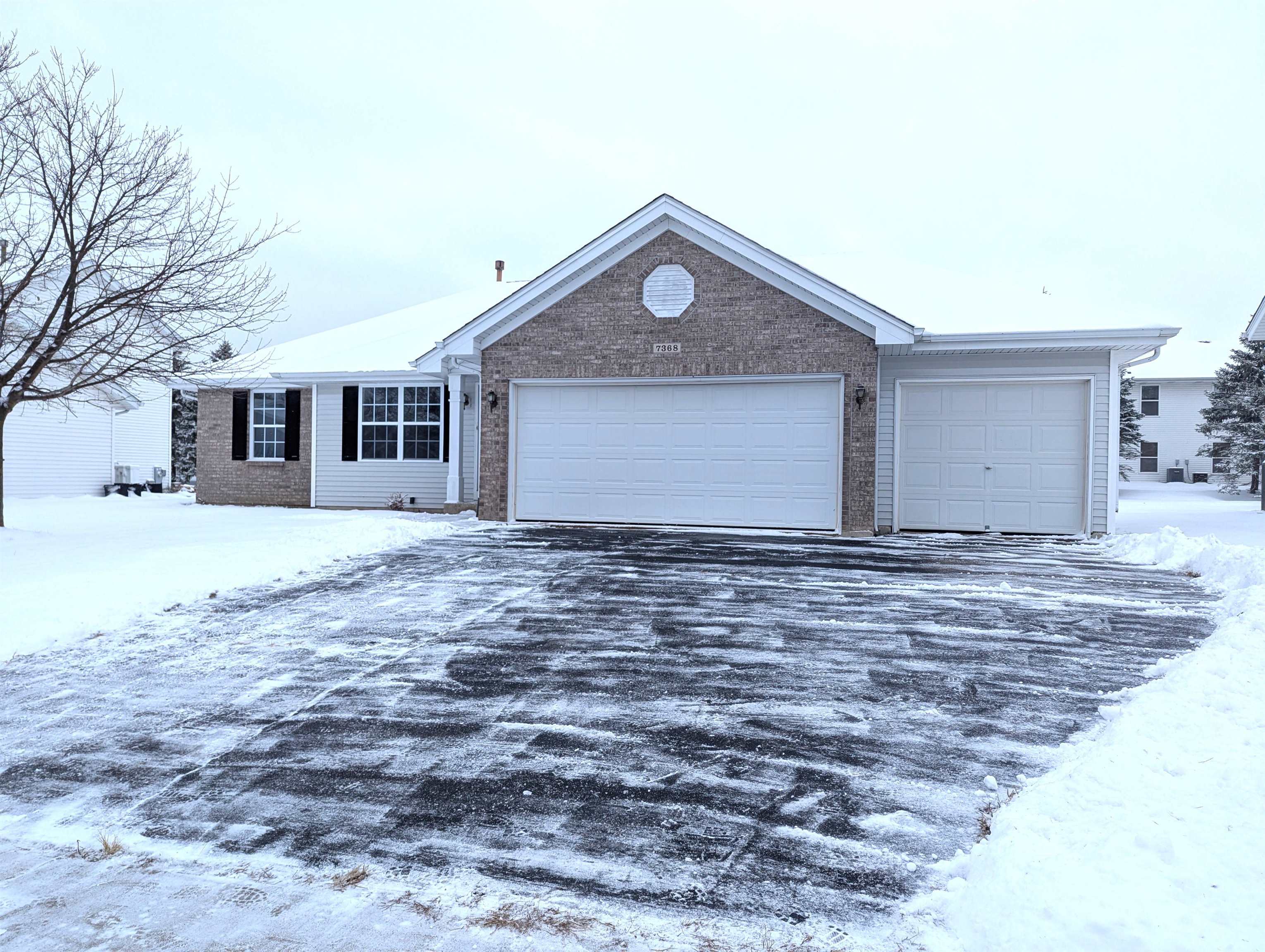 a front view of house with yard