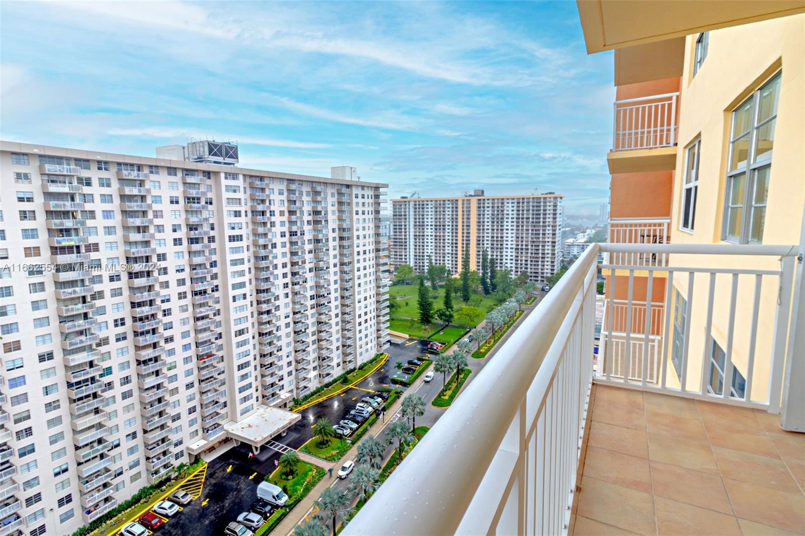 a view of balcony with wooden floor