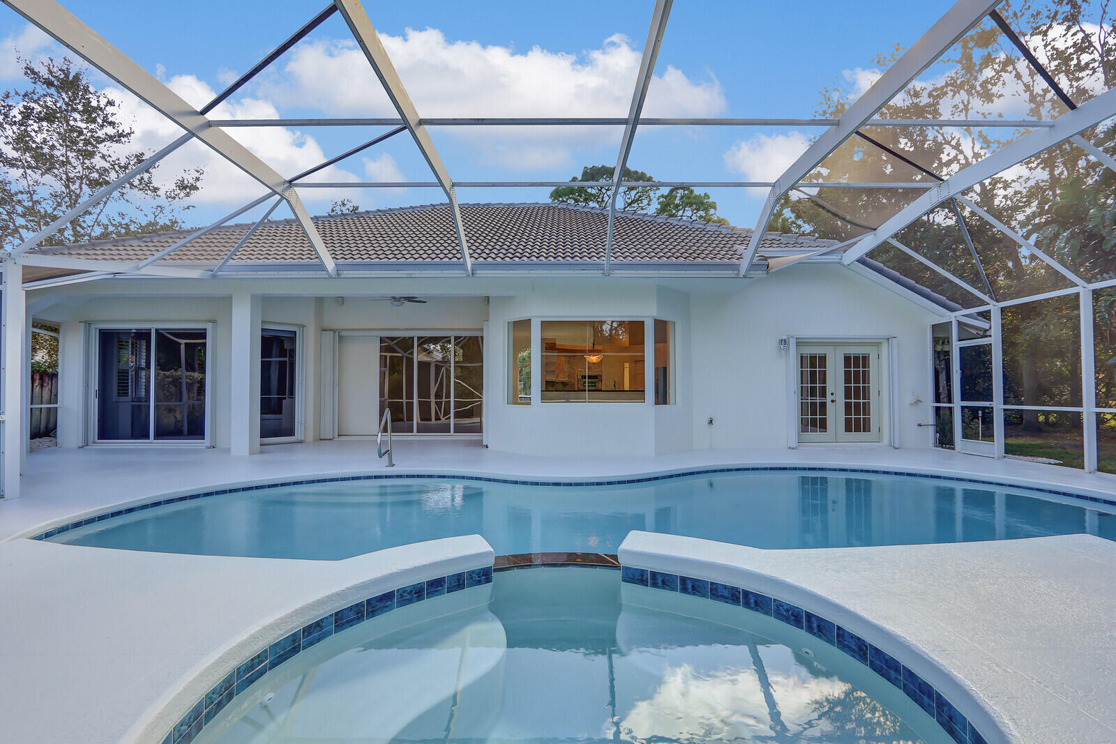 a view of a house with a swimming pool