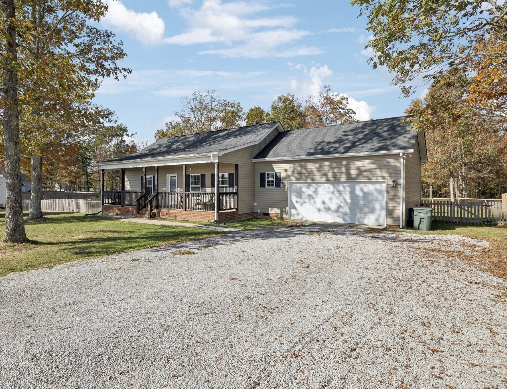 front view of a house with a big yard