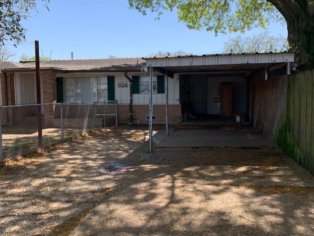 a front view of a house with yard