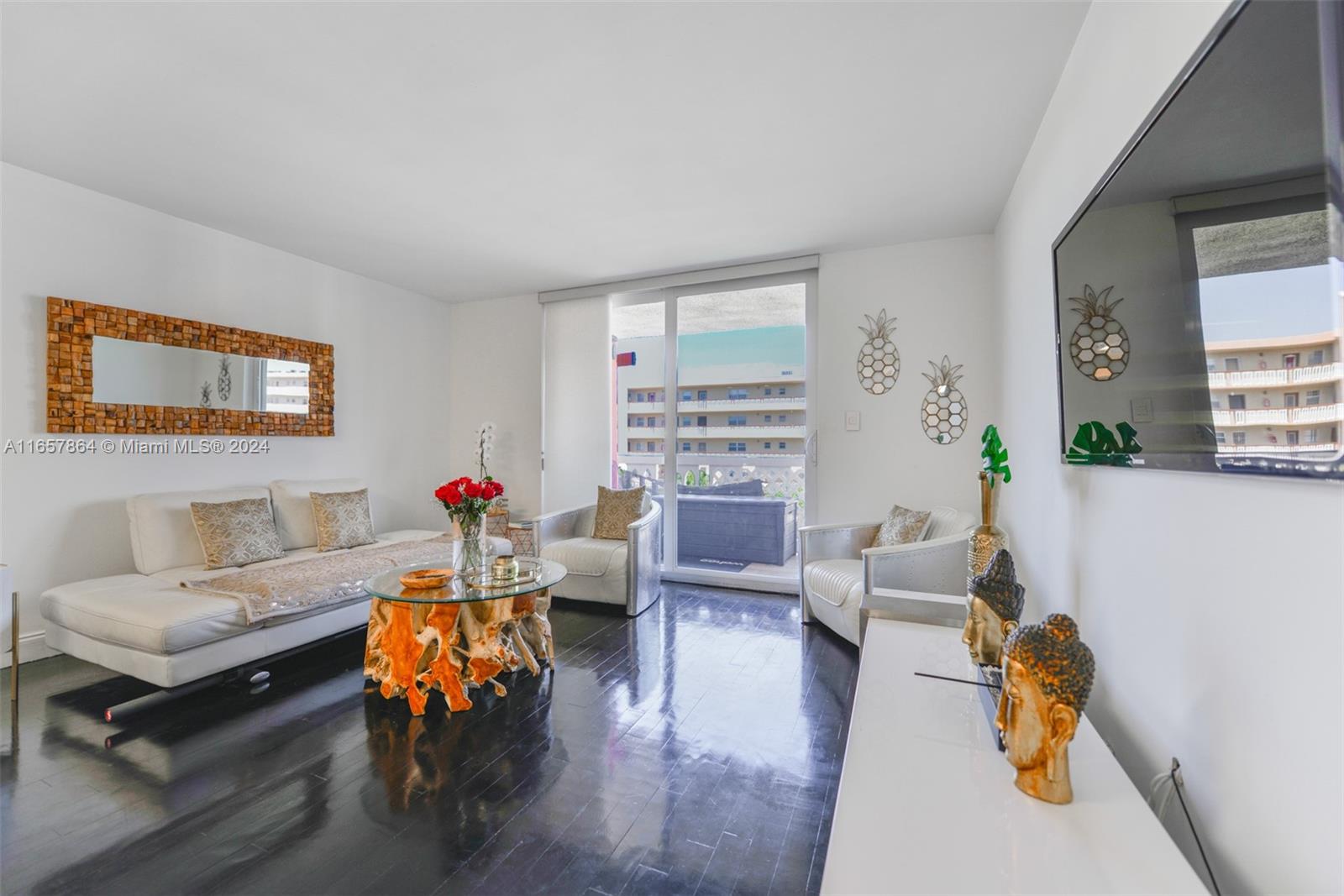 a living room with furniture and a table