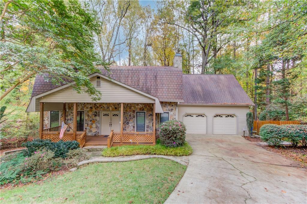 front view of a house with a yard