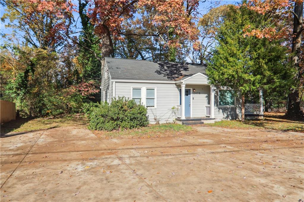 front view of a house with a yard