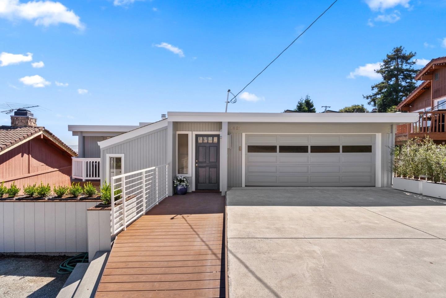 a view of a house with a garage