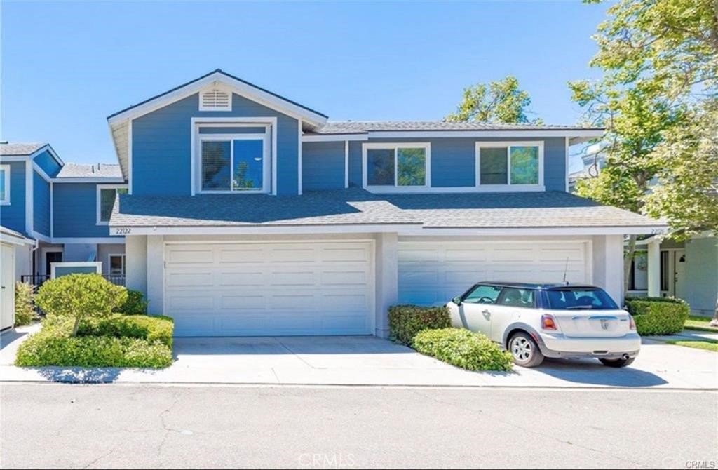 a car parked in front of a house